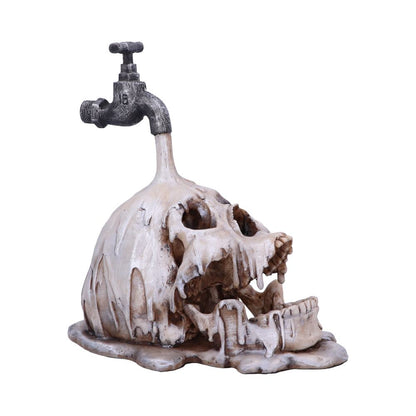 Tapped Skull Figurine