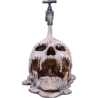 Tapped Skull Figurine