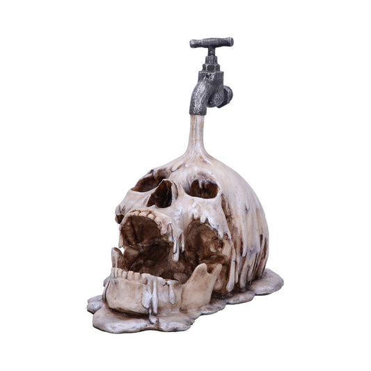 Tapped Skull Figurine